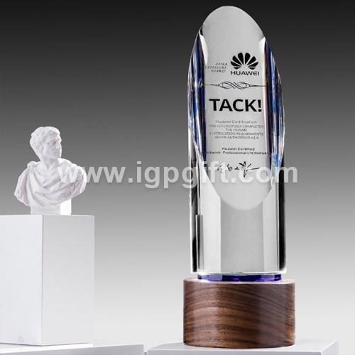 Cylindrical bevel cut solid wood trophy